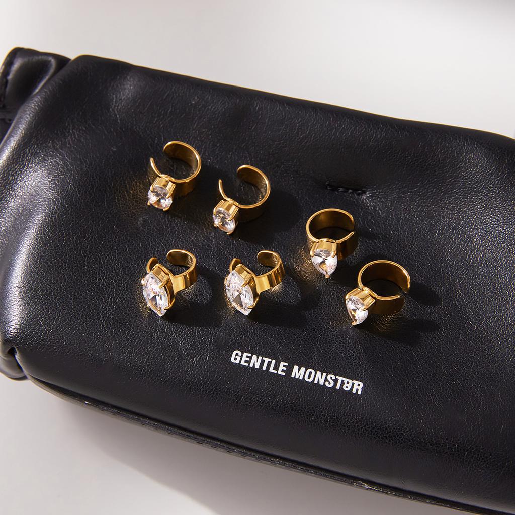 Light luxury high-end 18K gold, water drop-shaped zircon earclip earrings jewelry.