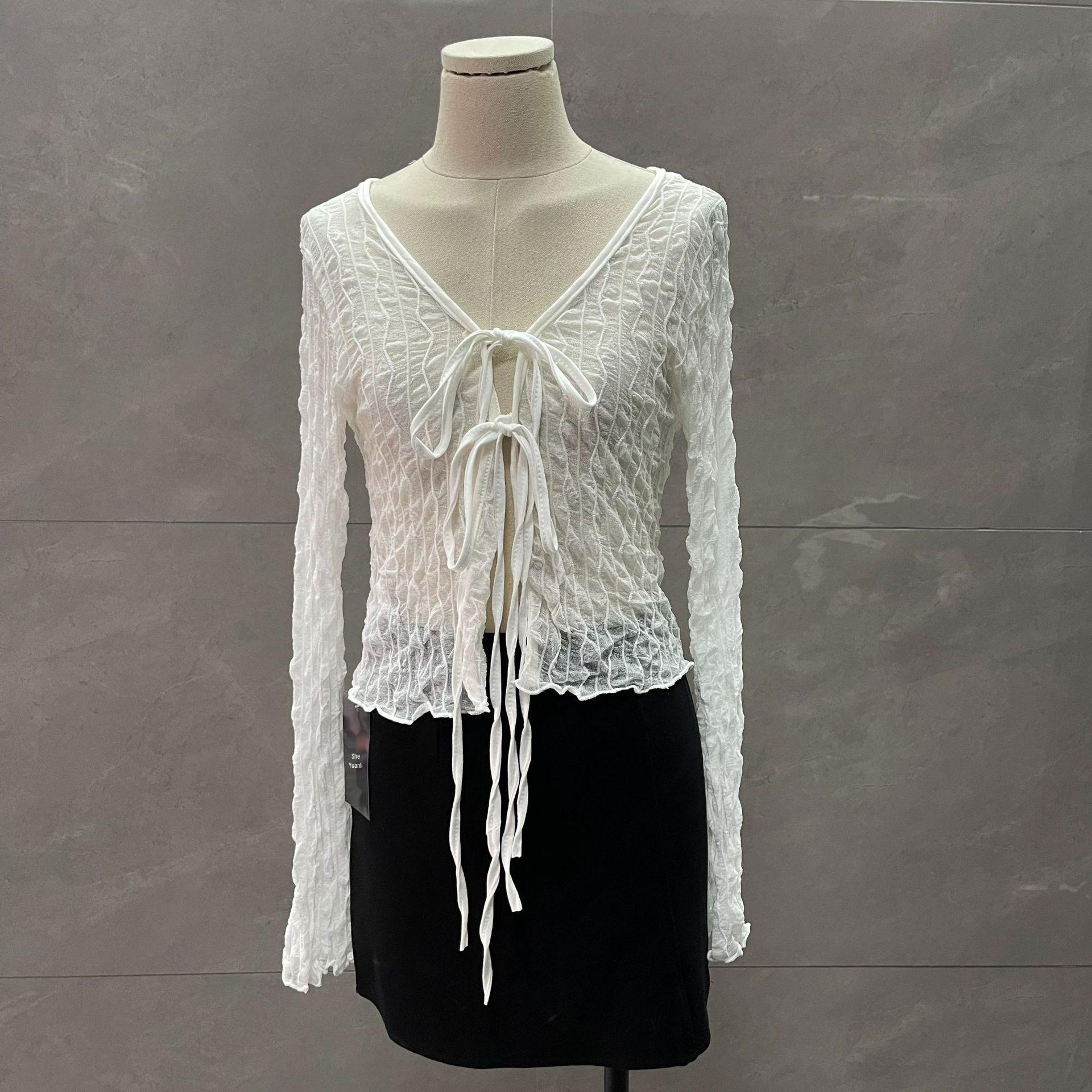 

Элегантный женский кардиган с длинными рукавами, завязками и расклешенным низом, с отделкой из тюля XL (Approx. 62.5 kg)