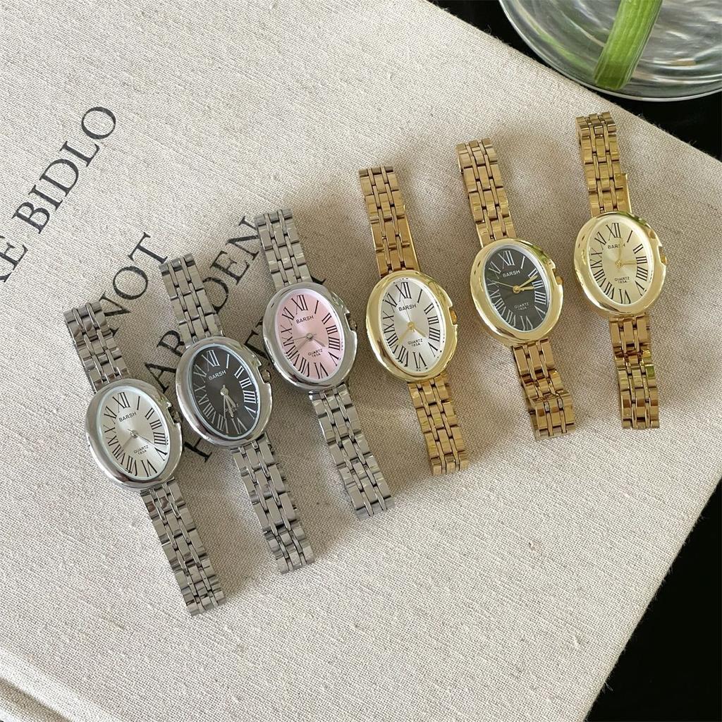 Retro gold women's watch, fashionable oval shaped temperament, steel strap, quartz watch