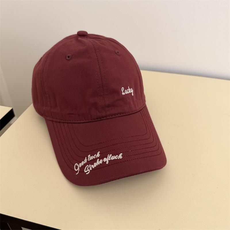Simple small letter embroidered baseball cap women's spring and summer travel wide brim sunshade versatile face small cap