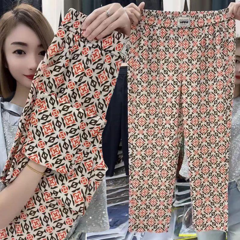 

Ice Silk Cool Thin Straight Barrel Nine Points Casual Elastic Pants Four-leaf flower-Orange XL