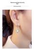 925 Sterling Silver Angel Teardrop Earrings for Women, High-End Niche Light Luxury with Cat's Eye Stone.