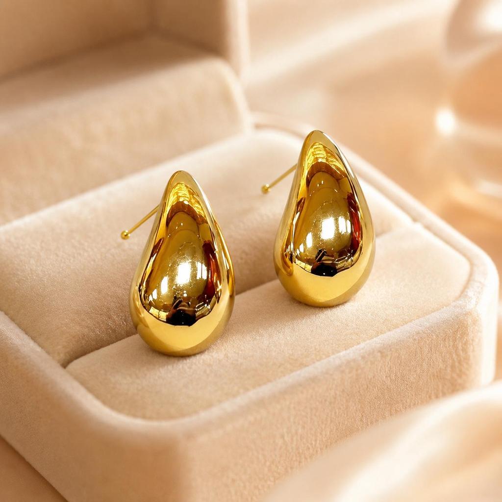 Trendy Water Drop Gold Stud Earrings: European & American Niche Design, Stainless Steel Dangles.