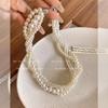 Twisted Layered Pearl Choker Necklace for Women - Elegant Korean Style Sweater Chain.
