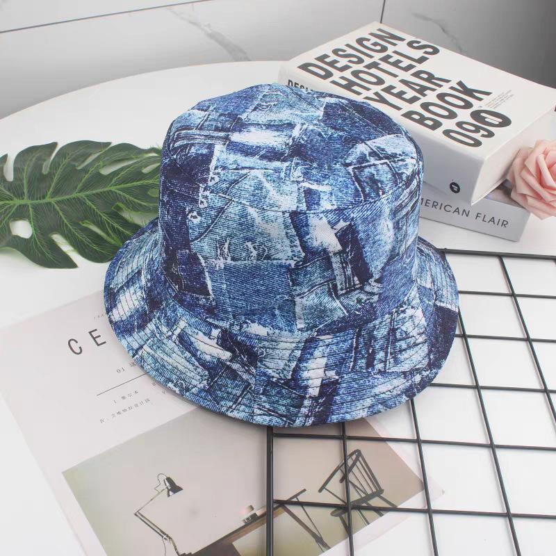 Nuovi Cappelli a Secchiello alla Moda con Graffiti Protezione Solare Stampa Lettere Moda Cappello da Pescatore Primavera/Estate Unisex Ombreggiatura Esterna Cappello da Pesca