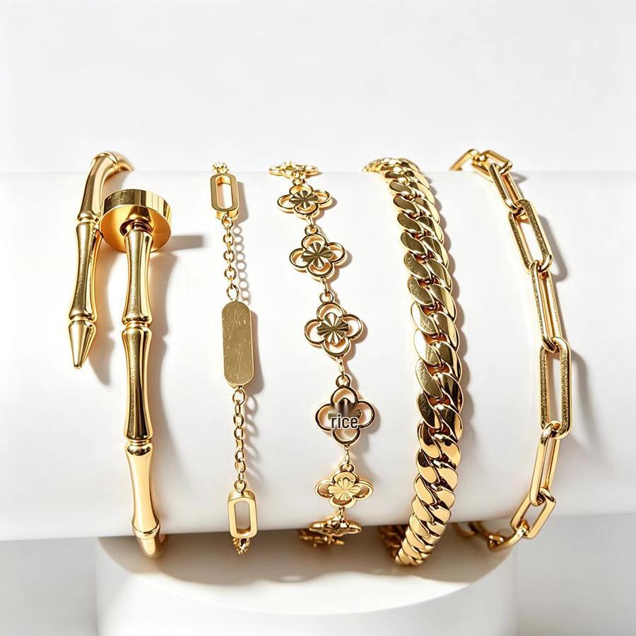 European & American Light Luxury Gold-Plated Titanium Bracelet Set: Bamboo Joint, Four-Leaf Clover, Cuban Chain Design for Women