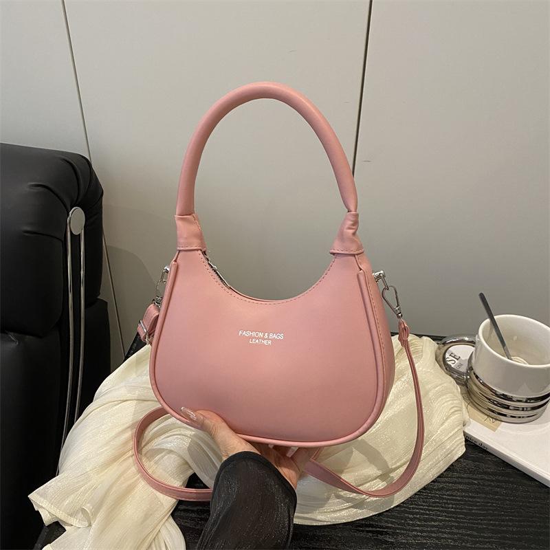 

Сезон 2025 новая портативная сумка-полумесяц женская модная подмышечная сумка повседневная простая сумка через плечо для通勤 женская сумка розовый