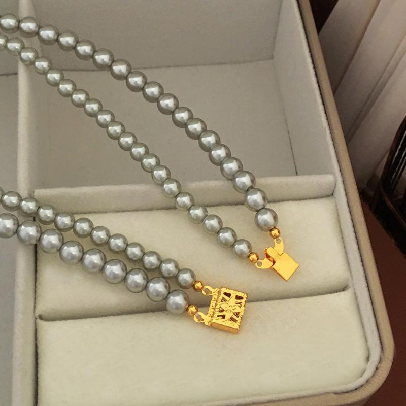 

Винтажное ожерелье из жемчуга в два ряда - Элегантный чокер с роскошным дизайном для женщин