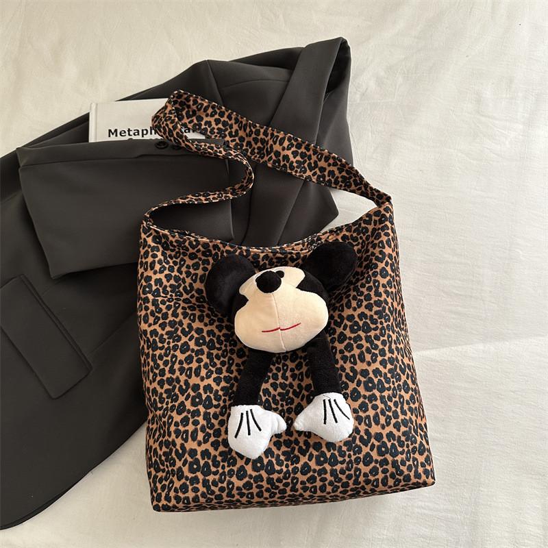 

Trendy Brown Leopard Print Canvas Shoulder Bag With Spacious Design For Everyday Use Brown Leopard,Without Pendant