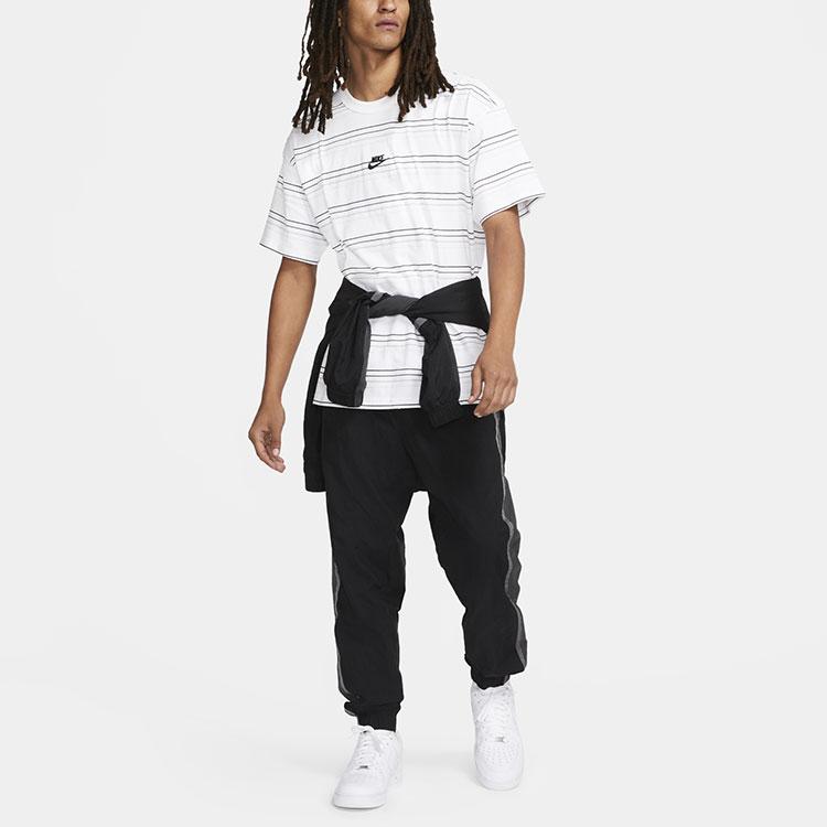 Nike Maglietta Sportiva a Maniche Corte con Logo Ricamato a Righe e Maglia Larga da Uomo Bianco DB6532-100