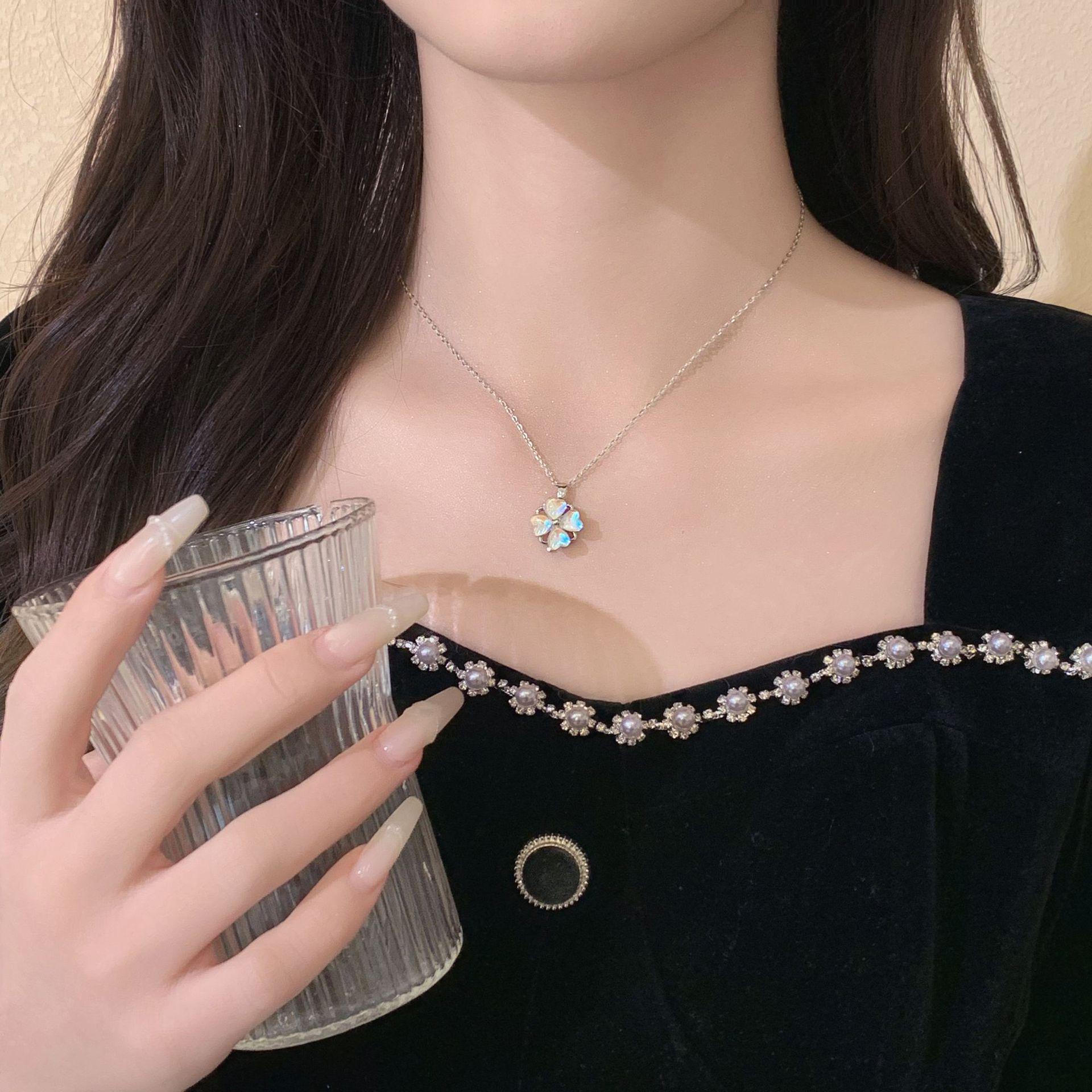 Four-Leaf Clover Heart Titanium Steel Necklace for Women - Colorfast Clavicle Chain with Cat s Eye Stone Pendant, Light Luxury Fashion.