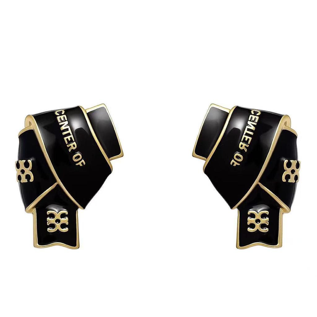 Black & Gold Enamel Twist Earrings: Versatile Luxury Studs for Autumn/Winter 2025