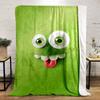 A Playful Green Cartoon Face with Big Eyes, Teeth, and a Sticking-out Tongue. for All Seasons Blanket Lunch Break Throw Gift