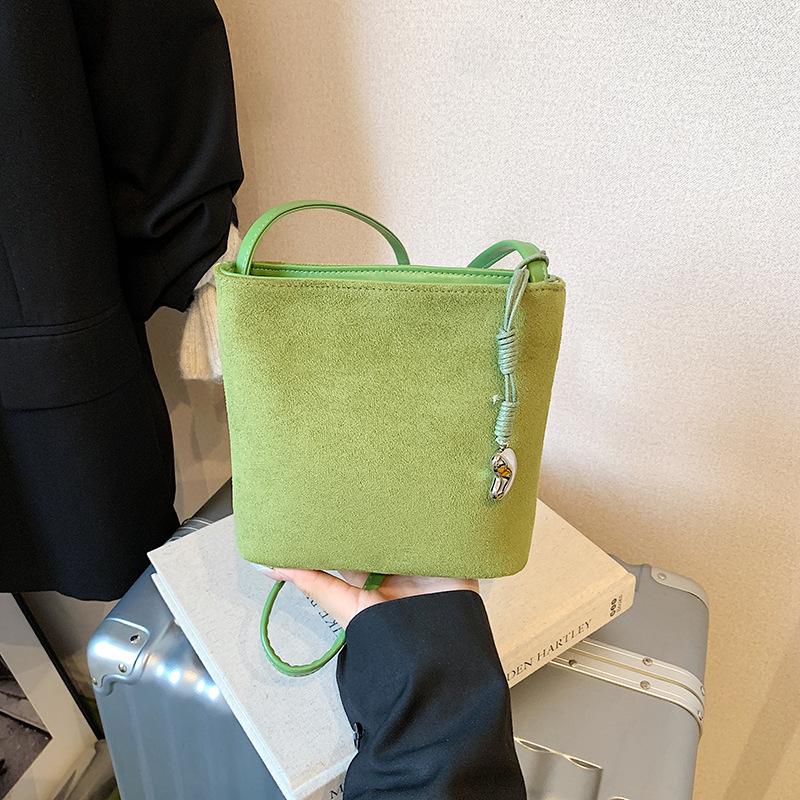 New frosted leather bucket bag women's high-end niche design bucket bag retro suede shoulder messenger bag