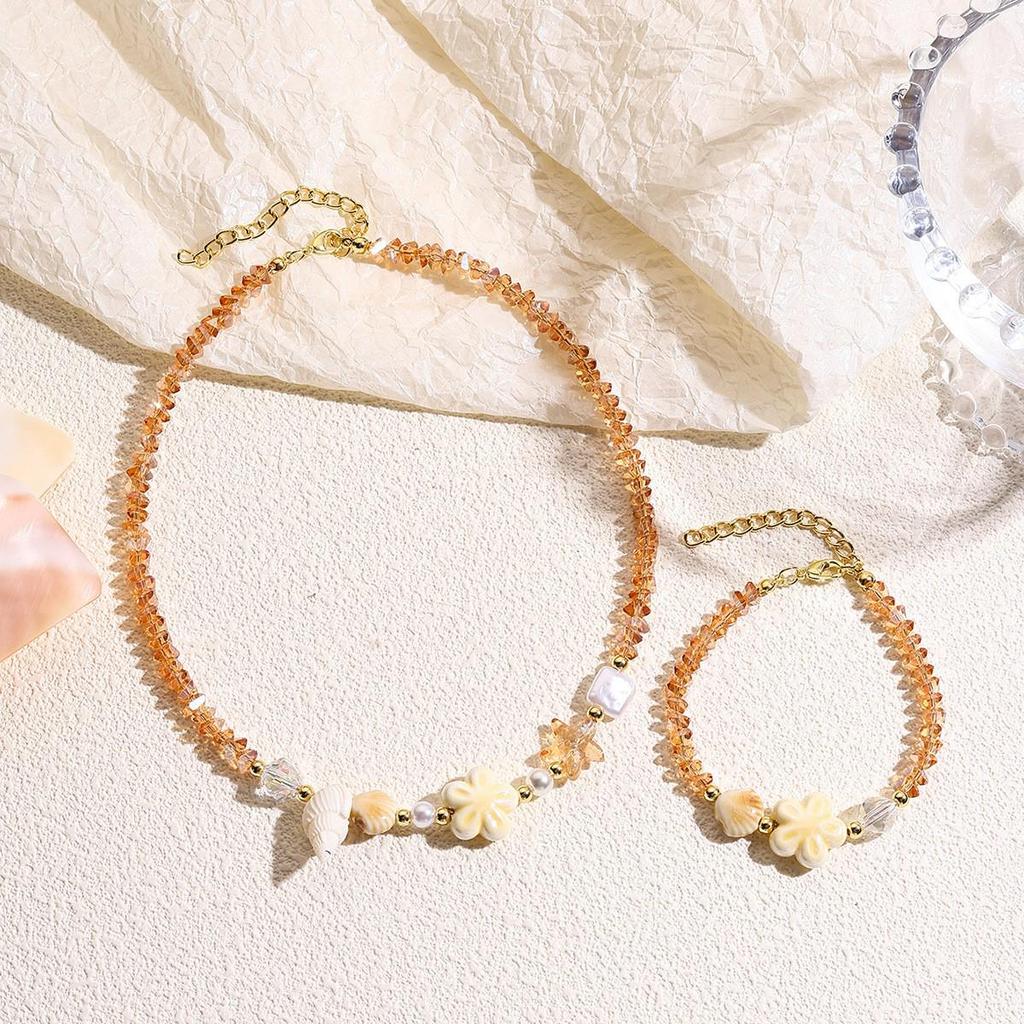 Seaside Elegance: Starfish & Shell Bead Bracelet with Oceanic Flair