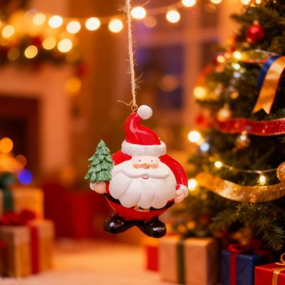 Plump Santa Claus Figurine Resin Santa Holding Christmas Tree Ornament Cute Santa Statue with Metal Hanging Ring for Tree or Desktop Holiday Decor
