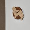 A stylish wooden wall clock featuring a golden retriever in This analog clock is perfect for or any beige. silent, bedrooms, homes, room.
