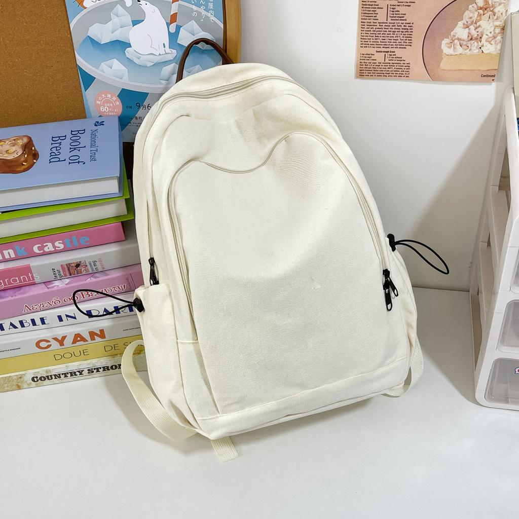 Schoolbag Solid color canvas backpack female Harajuku simple large capacity high school college student schoolbag Mori travel texture backpack
