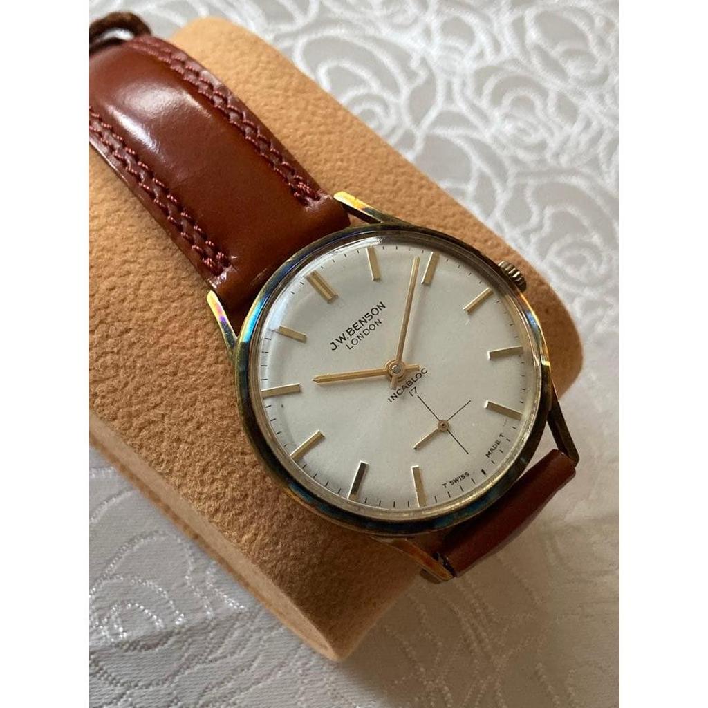 Used Good condition, Warrant to the British Royal Family, J.W.BENSON, Swiss made, in good working condition.