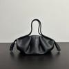 2025 New Internet Celebrity Catwalk Model Leather Cloud Bag Dumpling Bag Drawstring Women's Bag Fashion High Sense Messenger Portable