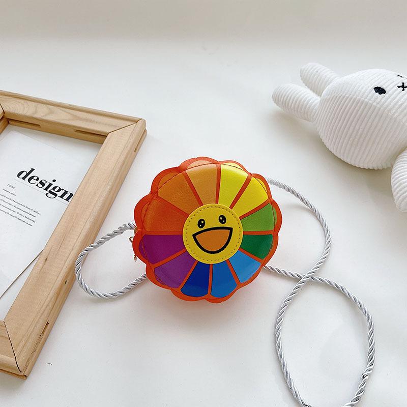 

Children s bag 2025 new colorful sunflower kindergarten baby messenger bag fashionable and cute cartoon change bag оранжевый