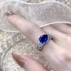 Elegant Adjustable Sapphire-Colored Gemstone Ring for Women with Micro-Paved Zircon Diamonds - Versatile and Stylish Gift.