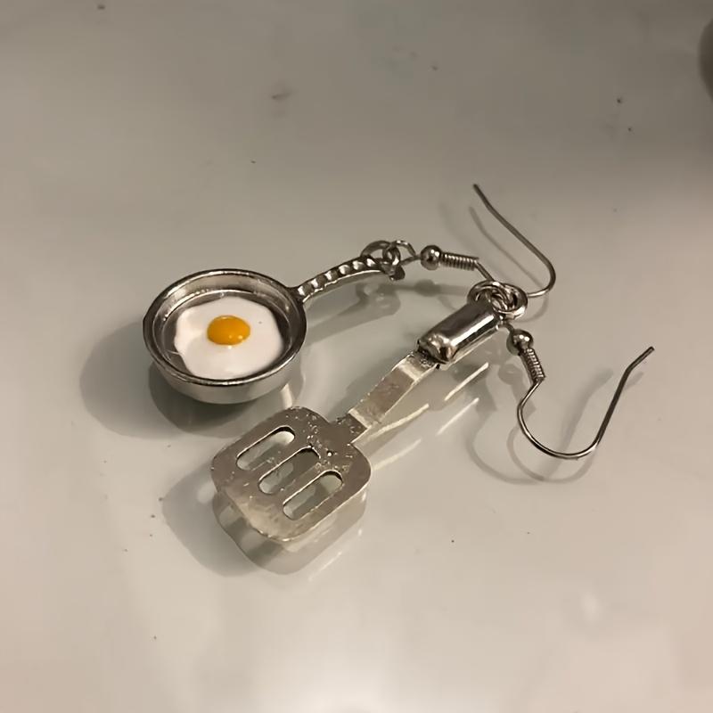 A Pair of Cute Asymmetrical Earrings Shaped Like a Frying Pan And Spatula, Perfect for Daily Wear for a with a Playful Heart