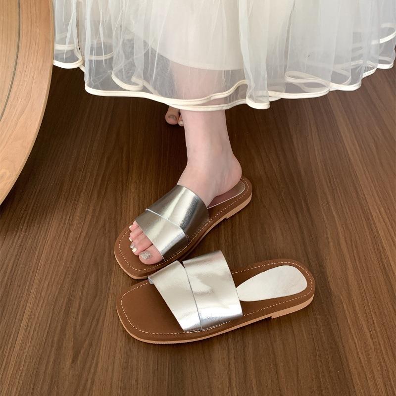 

Niche design sense ретро квадратная голова открытый носок плоская подошва тапочки женская летняя одежда сказочный ветер морской отпуск пляжные сандалии 35 серебряный