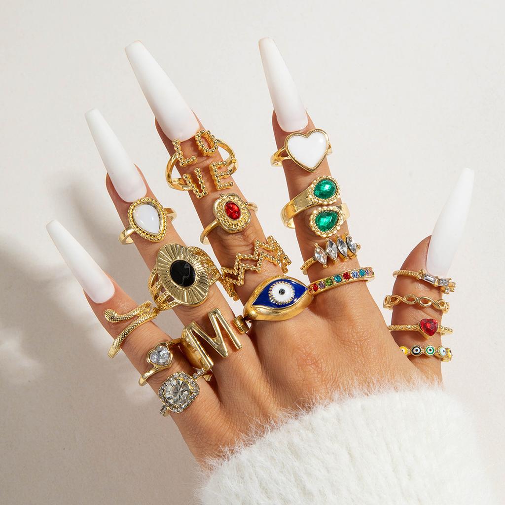 Vintage metal imitation emerald diamond ring set design sense love snake ring set women