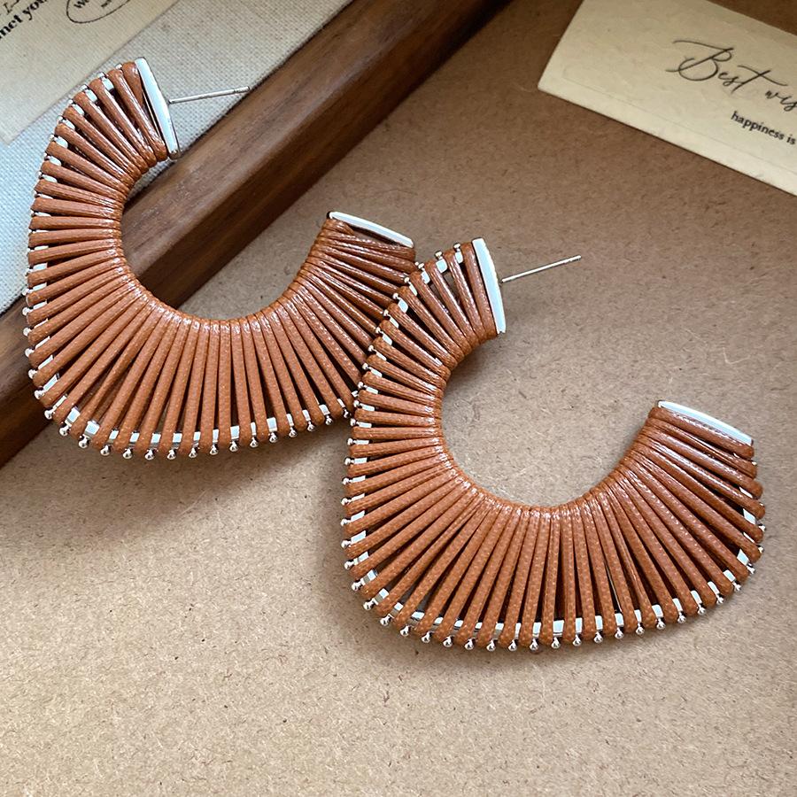 

Silver needle leather rope woven geometric earrings European and American new niche design earrings light luxury high-end earrings women