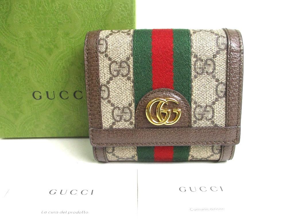 

Автентичний бежевий шкіряний гаманець GUCCI з двома складками Ophidia GG з двома складками №a508 відновлений