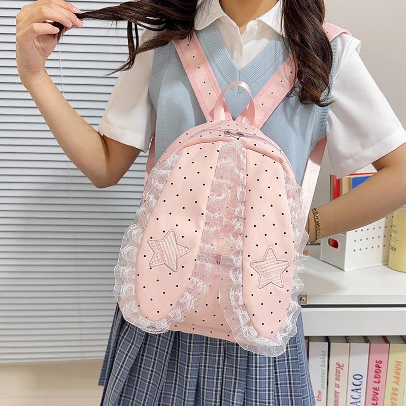 Schoolbag Korean version of sweet girl polka dot lace backpack new lop-eared rabbit trend high value travel foreign style backpack