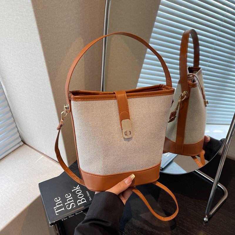 Retro bucket bag women's summer new fashion simple shoulder bag commuter messenger bag