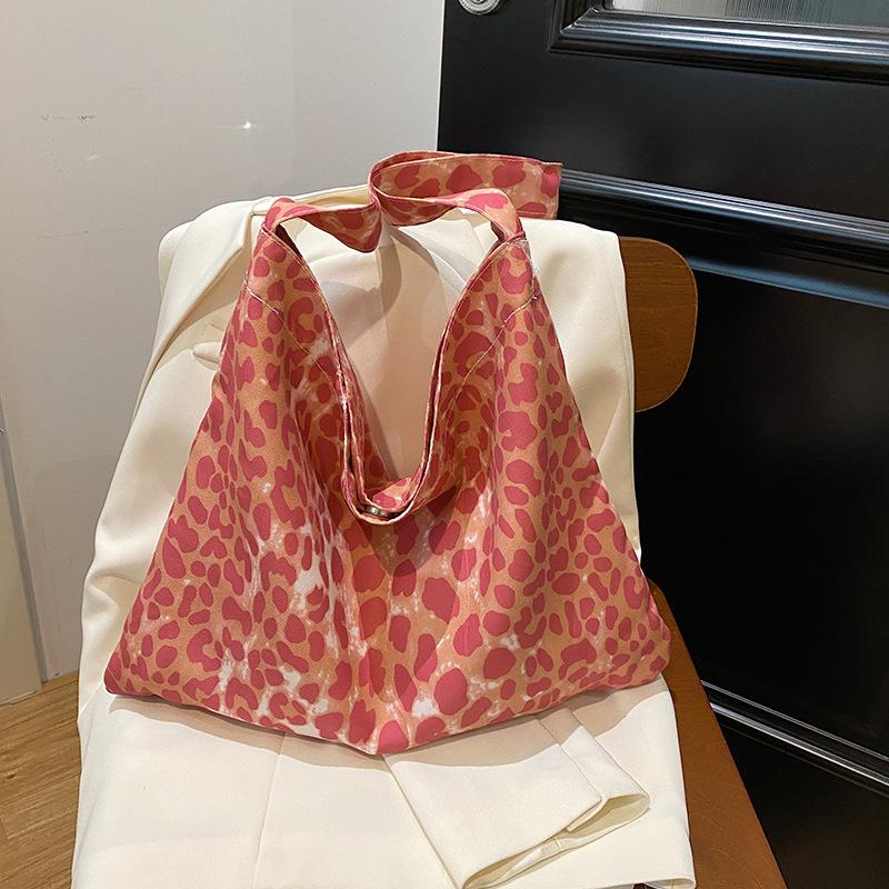 

Leopard print fashion canvas bag women s new high-end versatile casual tote bag casual large-capacity portable shoulder bag 40*30*3cm розовый