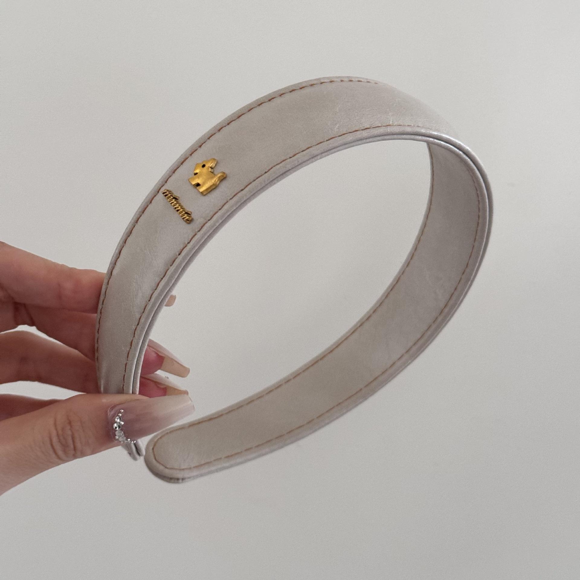 

Ретро кожаный ободок в форме собаки с широкими полями, с высококлассным ощущением и высоким ободком на макушке бежевый