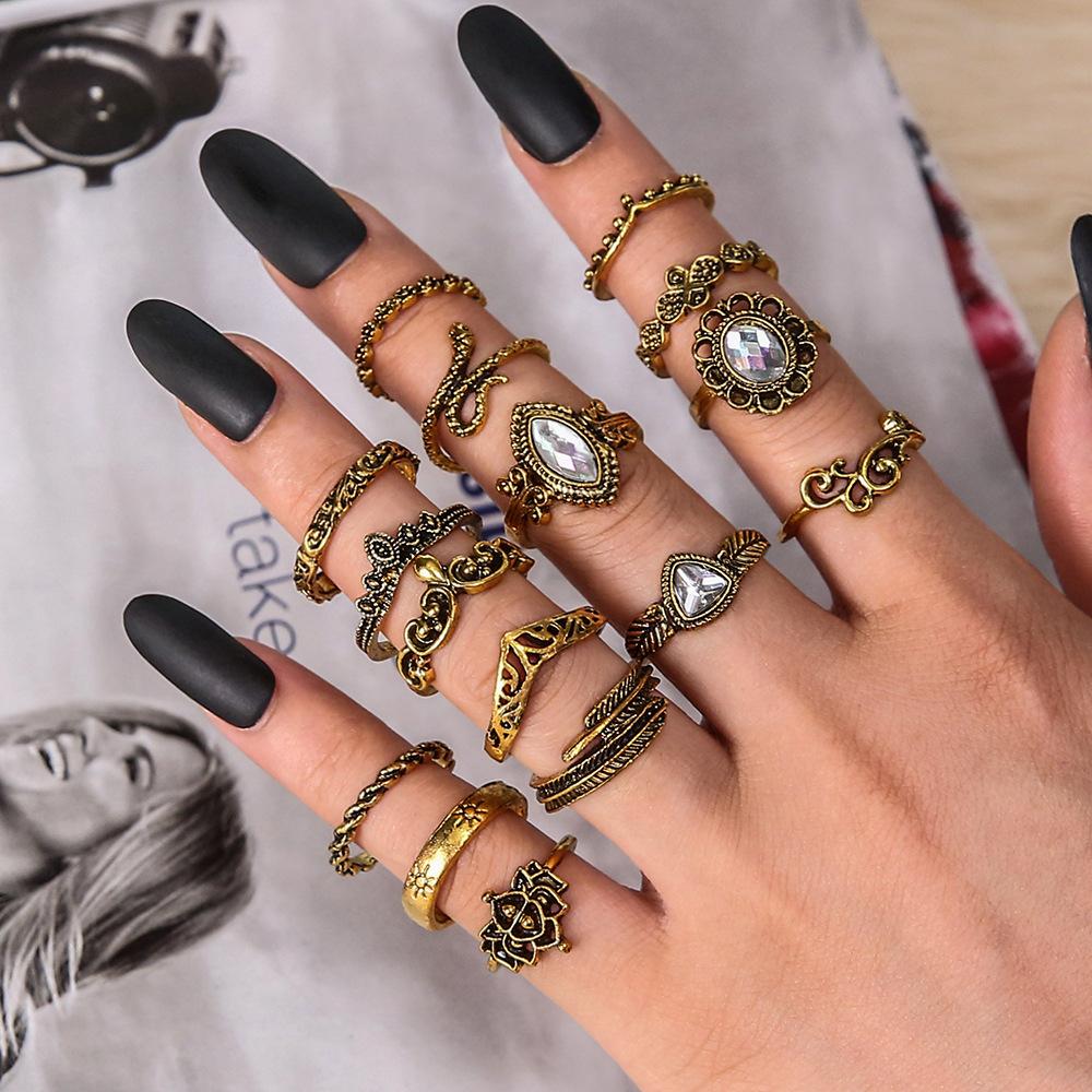 Europe and The United States New Ring Retro Exaggerated Hollow Carved Snake-shaped Feather Gem 16-piece Combination Ring Foreign Trade