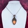 Orange Carved Bone Face Pendant Copper Wire Wrapped Rainbow Moonstone Pendant