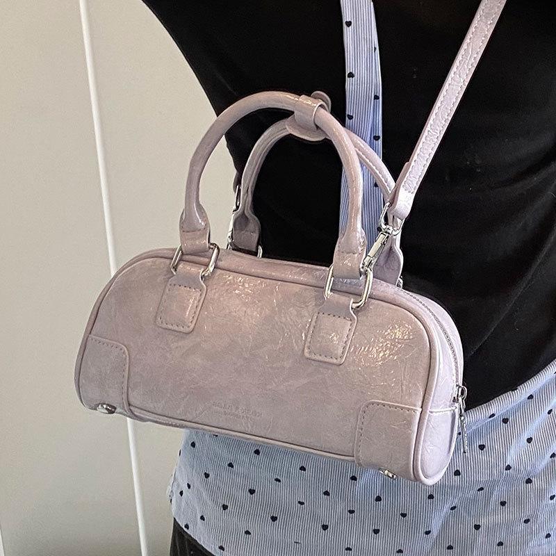 Korean niche simple portable bowling bag women 2025 new versatile foreign style fashion messenger pillow bag