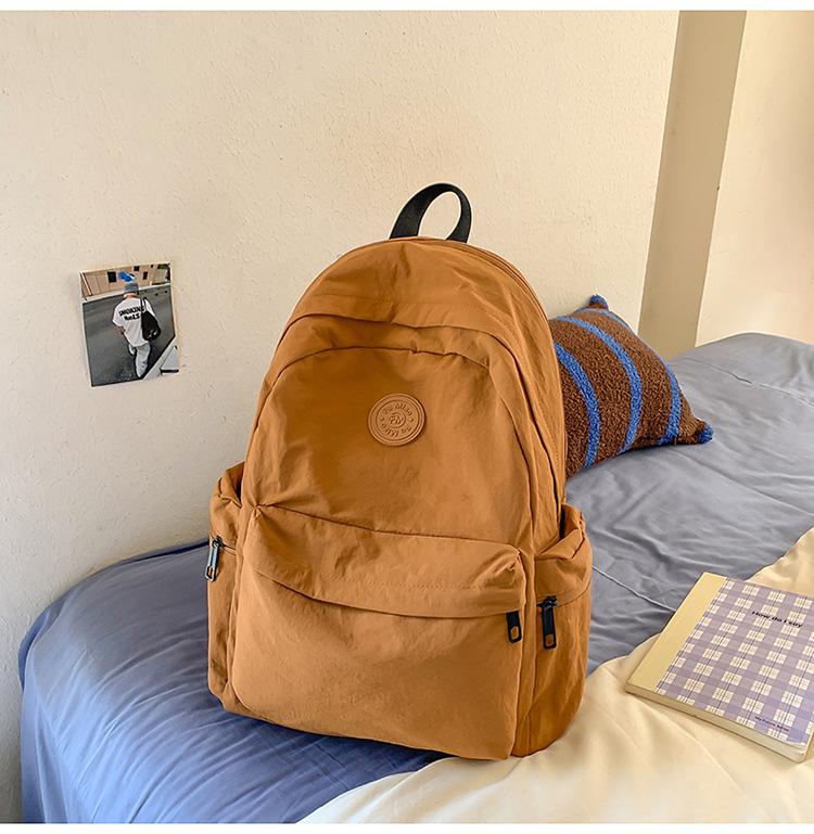 School bag Japanese simple solid color backpack light commuting large capacity student school bag casual versatile outdoor travel backpack