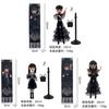 Wednesday Addams 9 Zoll PVC-Puppe mit Schuluniform und dunklem Stil Dekor