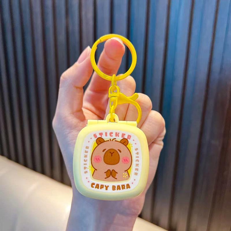 Cartoon Mini Sticker Machine Bomb Surprise Box Keychain Toy for Kids жёлтый