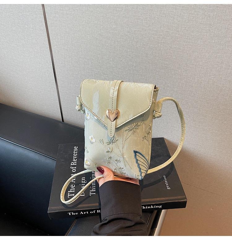 Embroidered canvas bag women's summer new fashion niche messenger bag mobile phone bag