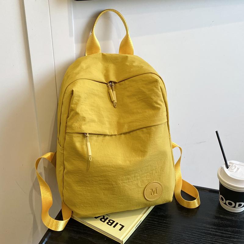 Large capacity bag new simple casual versatile backpack female college student schoolbag lightweight travel backpack