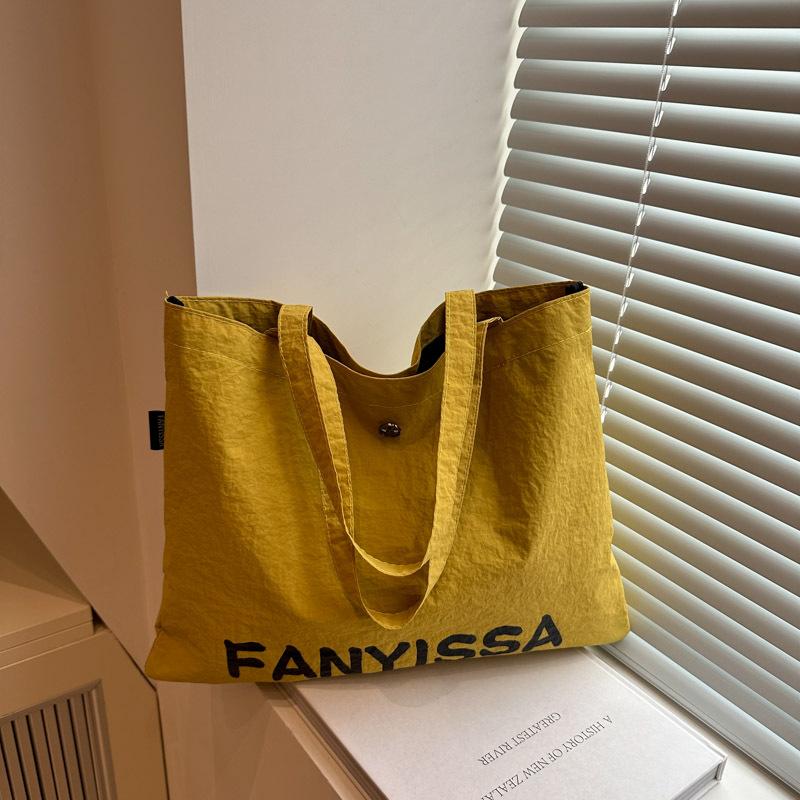 

Korean version of large-capacity lazy style literary cloth bag printed letters college student simple shoulder bag portable tote bag women жёлтый