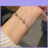 Bracciale Minimalista Floreale in Rame Zirconato per Donna con Design Elegante