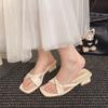 Summer new outer wear fashion design sense niche middle heel fold cross square head thick heel cool slippers women