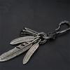 Distinctive Feather Keychain Charm In Antique Silver With Turquoise for Individualistic Fashion Statements Pieces