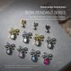 2pcs Nail Art Jewelry: Metal Bow and Octagonal Rhinestone Pendants