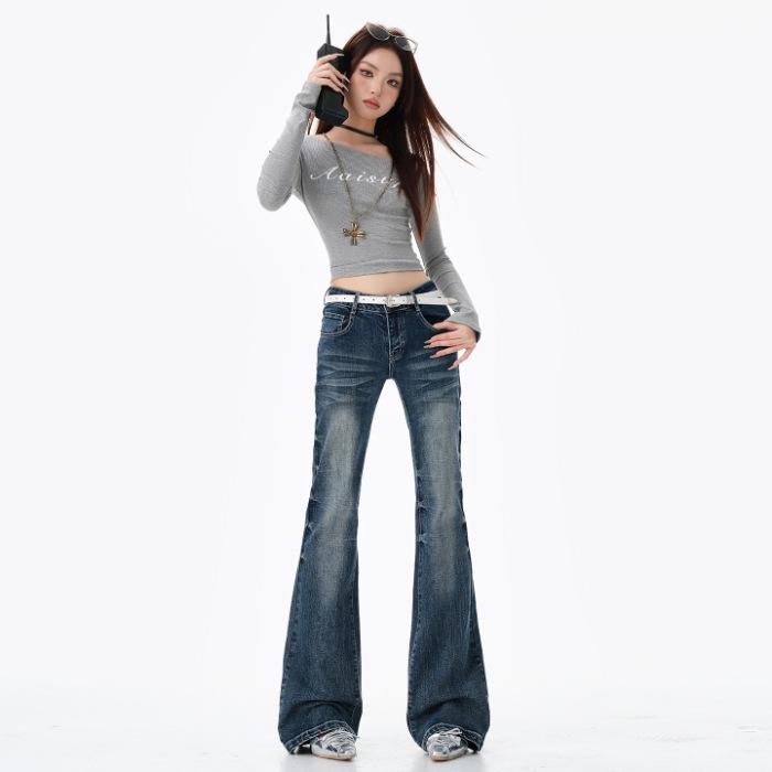 American low-rise Spice Girl micro-pull jeans women's new design sense retro dark blue elastic thin flared pants