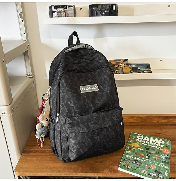 School Bag New Large Capacity Trend Versatile Junior High School Student School Bag Couple Fashion Embossing Simple Casual Lightweight Backpack